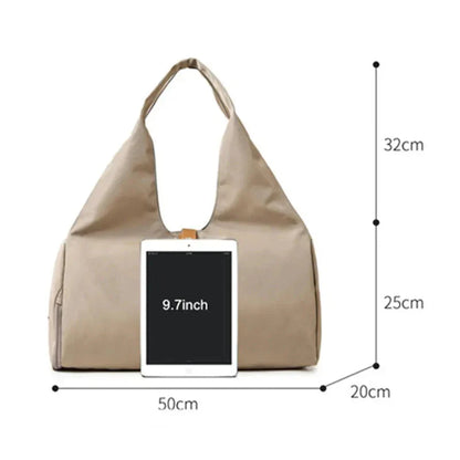 Dimensions du sac de sport : 50 x 20 x 25 cm, anses 32 cm